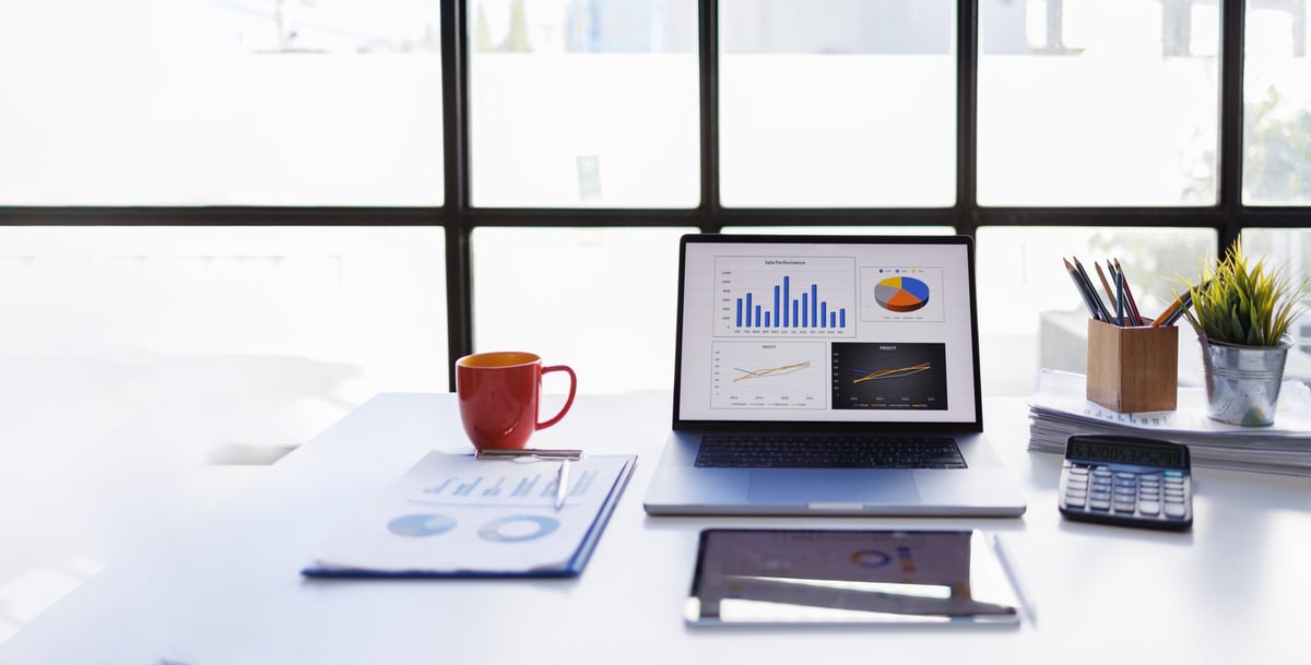 Business professionals analyzing financial charts and planning strategy